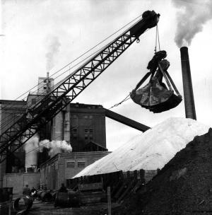 This Crane Feeds Sulphur to the Jensen Bleaching Towers