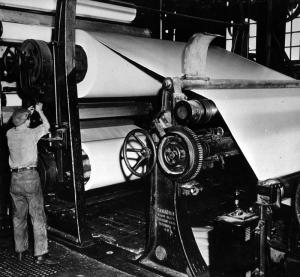 A Machinist Checking the Condition of a Machine in the Paperboard Department at the Edmundston Fraser Mill