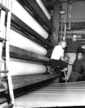 Workers at the Paperboard Department  of the Fraser Mill in Edmundston