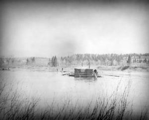 Floating Cook Shack and Boat on the Tobique River