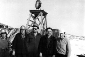 Group of Men at the Saint Jacques Conveyor