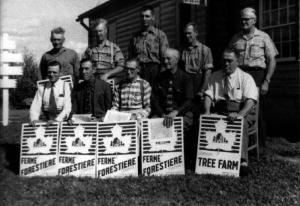 A Group of Persons Awarded a Prize for the Best Woodlot