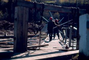 Two Men Feeding a Haul-up at the Plaster Rock Sawmill