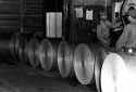 Workers Weighing Paper Rolls