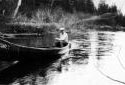 Mr. Joseph Nol Thibodeau Riding a Canoe