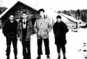 Four men at the Summit Depot