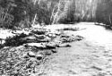 Logs Pile-up on a Stream Banks