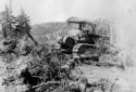 A Bulldozer Clears a Road in the Green River Forest