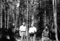 Mr. Lo Dionne and Three Loggers at Camp 58