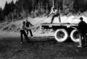 Men Lifting a Truck Tailgate