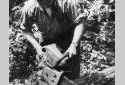 Logger Using an Old Model Chain Saw