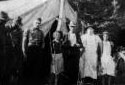 Group of Workers in Front of a Tent