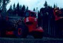 A Tree-Length Harvester with a Load of Timber