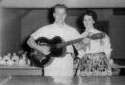 Mr. Antonio Thibodeau and his Wife at  a Quonset Hut